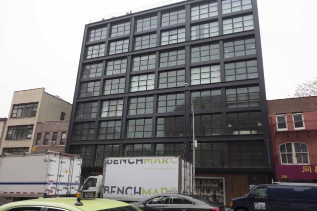 An 11,000-square-foot condo unit at 250 Bowery will become the ICP's new LES home, for a cool $23.5 million. (Photo via Commercial Observer)