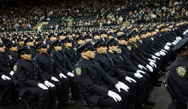 Graduates from the NYPD academy. (Photo: Andrew Burton/Getty Images)