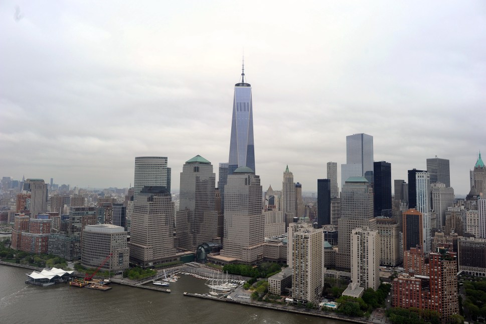 The One World Trade Center (C) is seen with other skyscrapers in New York, on May 14, 2014. The new World Trade Center is being erected on the site of the old Twin Towers, which was destroyed by Al-Qaeda suicide attackers on September 11, 2001, killing nearly 2,800 people. AFP PHOTO/Jewel Samad        (Photo credit should read JEWEL SAMAD/AFP/Getty Images)