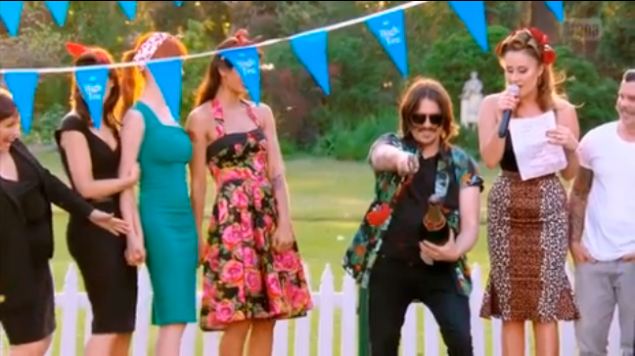 Oh, and Ben tries to slice open a bottle of champagne with, like, a machete.