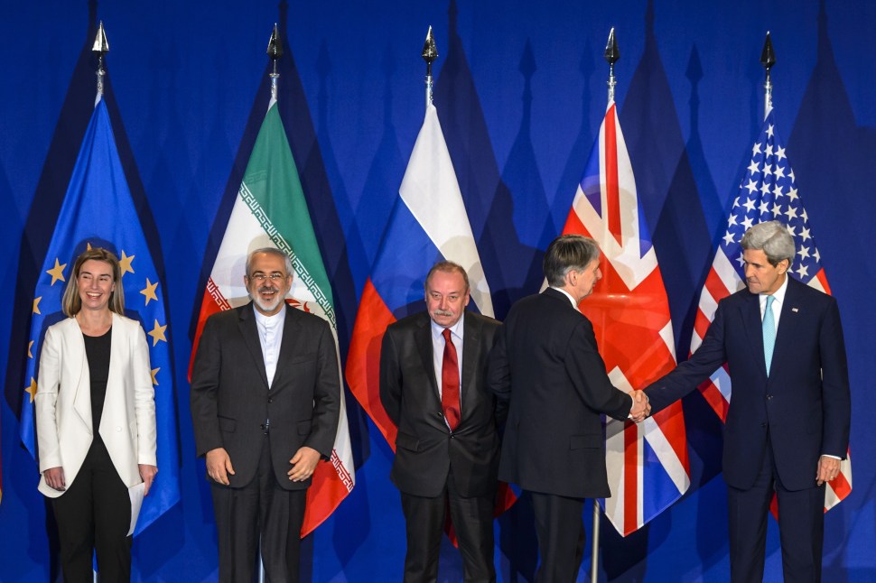 (From L) EU's foreign policy chief Federica Mogherini, Iranian Foreign Minister Mohammad Javad Zarif, Deputy director of the Department for Nonproliferation and Arms Control of the Ministry of Foreign Affairs of Russia Alexey Karpov, British Foreign Secretary Philip Hammond and US Secretary of State John Kerry attend the announcement of an agreement on Iran nuclear talks on April 2, 2015 at the The Swiss Federal Institutes of Technology (EPFL) in Lausanne. Iran and world powers said they had reached agreement on Thursday on "key parameters" of a potentially historic deal aimed at preventing Tehran from building the bomb. AFP PHOTO / FABRICE COFFRINI        (Photo credit should read FABRICE COFFRINI/AFP/Getty Images)