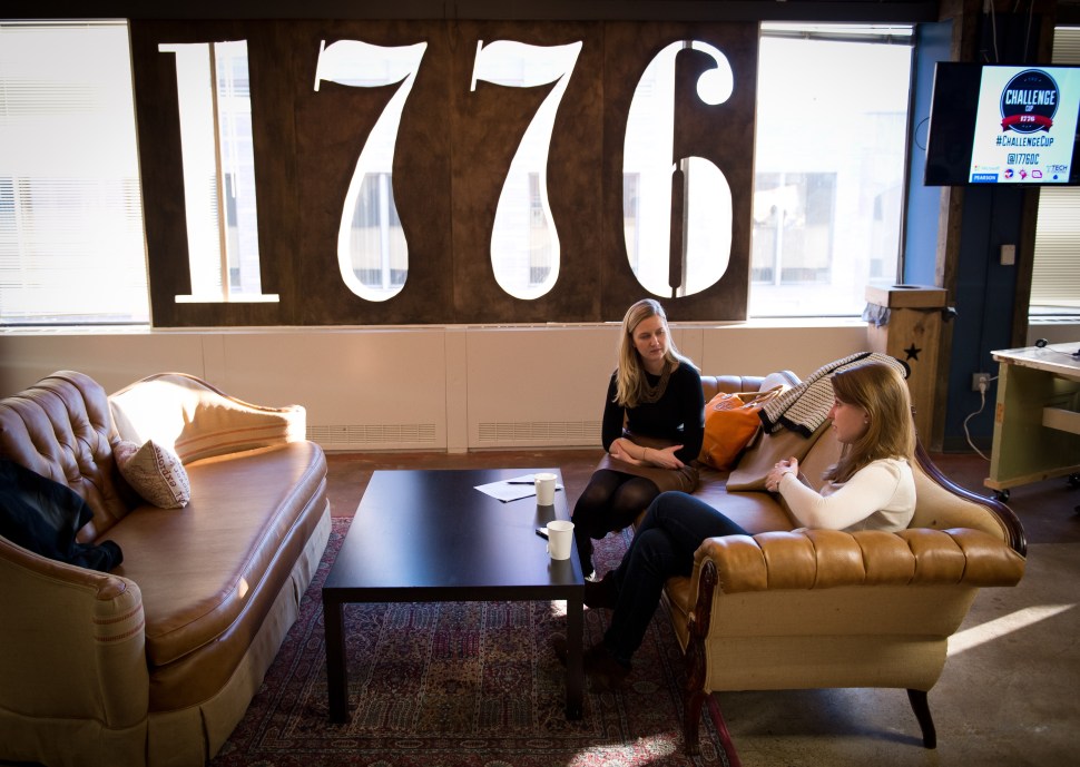 Employees of start-up companies work at their designated spaces at the offices of 1776 business incubator in Washington DC, February 11, 2014. 1776 hosts about 185 start-ups in its offices. The incubator  gives members a chance to take notes from high-profile entrepreneurs during what are known as lunch and learns. 1776 runs like a campus, with workshops, a communal kitchen and 24-hour access for members.  1776 was founded in January 2013 by Evan Burfield and Donna Harris, a pair of successful entrepreneurs with experience building companies and communities. AFP PHOTO/MLADEN ANTONOV        