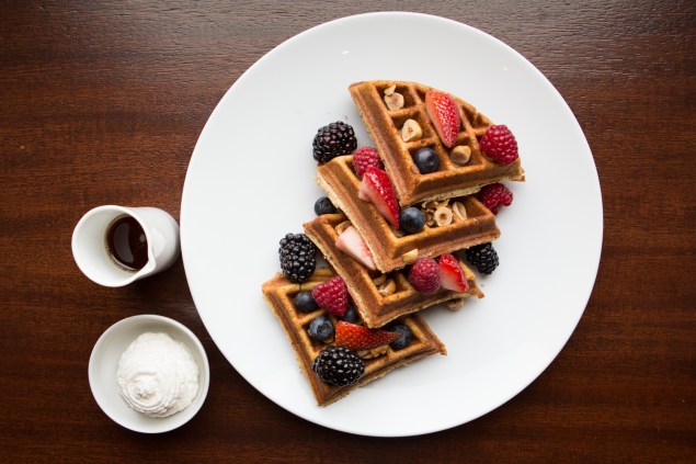 Hazelnut waffles with berries and cream served at The Clock Tower Restaurant in the New York EDITION hotel in the Flatiron District. (Photo: Arman Dzidzovic/New York Observer)