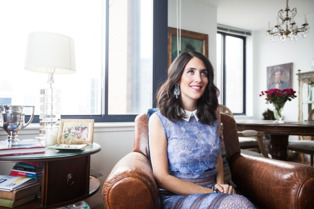 Ms. Morel in her Battery Park apartment. (Photo: Emily Assiran/New York Observer)