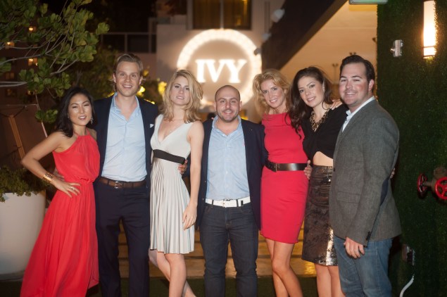 Ivy cofounders Philipp Tribel (second from left) and Beri Meric (middle) with the Ivy team at Art Basel. (Photo: Ivy/For New York Observer)