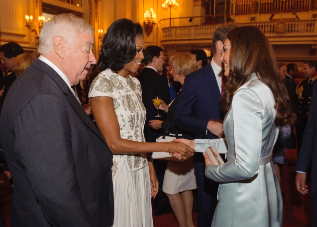Ms. Obama and the Duchess of Cambridge greeted each other at Buckingham Palace. (Photo by Dominic Lipinski - WPA Pool/Getty Images)