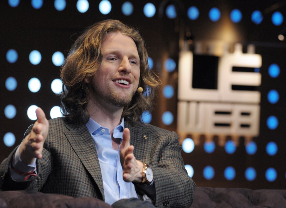 Matt Mullenweg, founder of web development corporation Automattic and Om Malik who also developped the free and open source web software, WordPress takes part in a jury for a Start-Up Competition during LeWeb conference in Saint-Denis, near Paris on December 6, 2012. Le Web is Europe's largest tech conference, bringing together the entrepreneurs, leaders and influencers who shape the future of the internet. AFP PHOTO ERIC PIERMONT (Photo credit should read ERIC PIERMONT/AFP/Getty Images)