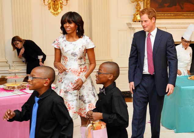 The First Lady and Prince Harry in May, 2013. (Photo: John Stillwell - WPA Pool/Getty Images)