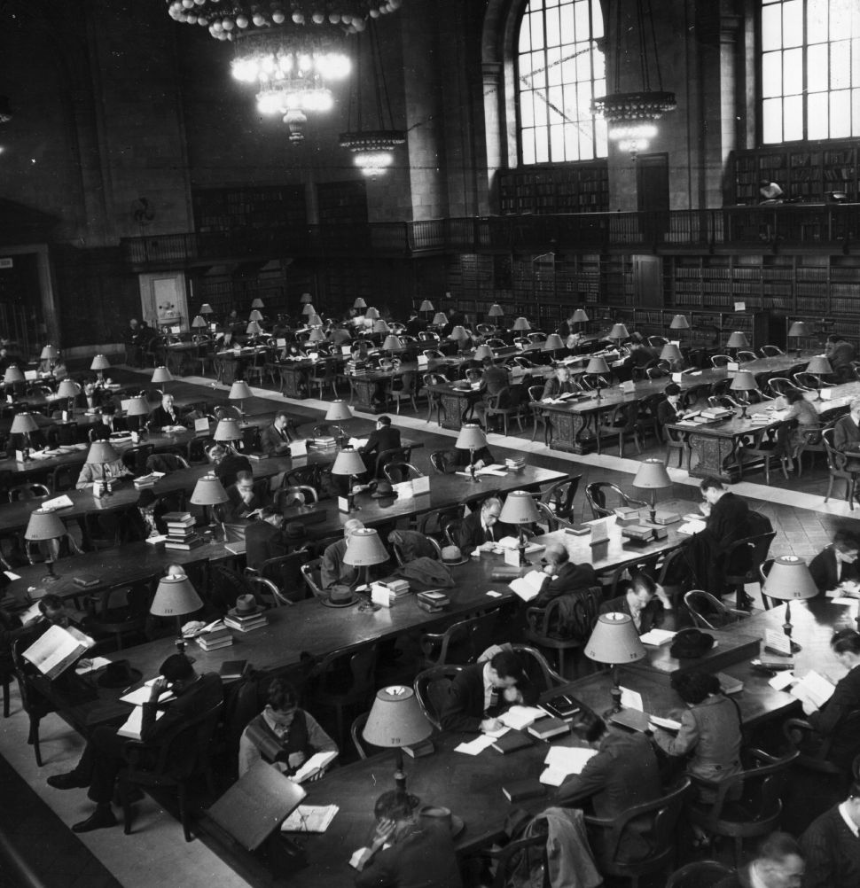 circa 1950:  One wing of the main reading room in the New York Public Library which houses the largest private collection in the USA.  (Photo by Three Lions/Getty Images)