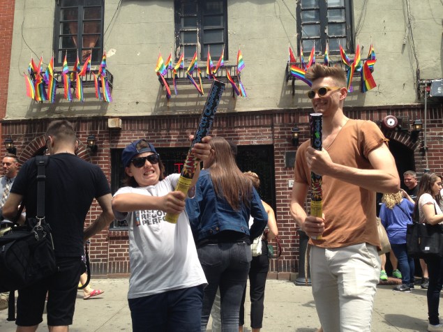 Two brothers set off roman candles outside The Stonewall Inn to celebrate The Supreme Court's legalization of gay marriage. (Photo by Justin Joffe/ Observer)