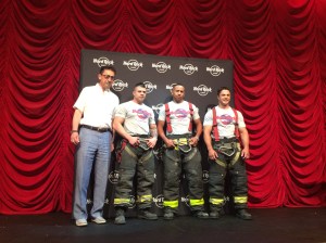 FDNY Comissioner Dan A. Niro with first responders and calendar models Miguel Ruiz, Anthony Montanez and Ralph Ciccarell