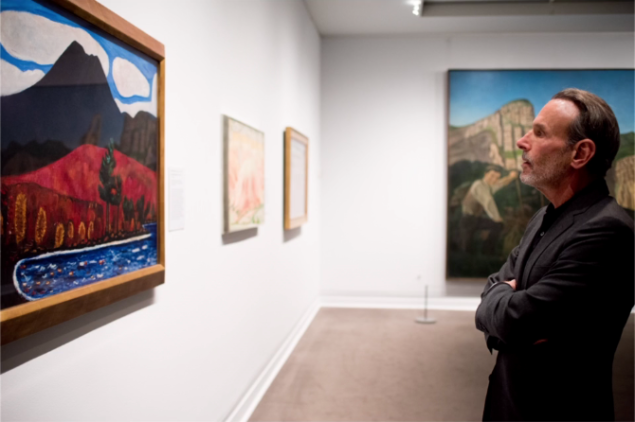 David Salle examining a painting by Marsden Hartley