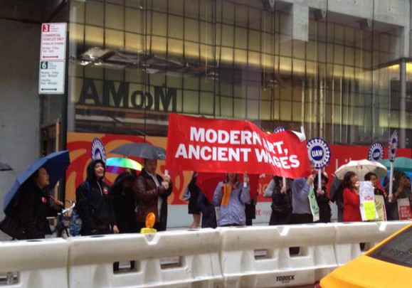 Union protest in front of MoMA, photographed by MoMA fellow and prominent Polish curator Magda Moskalewicz. (Courtesy Twitter)