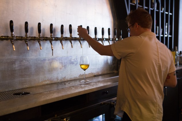 Joe Belletini tends the bar at Wassail on 162 Orchard Street. (Photo: Arman Dzidzovic/New York Observer)