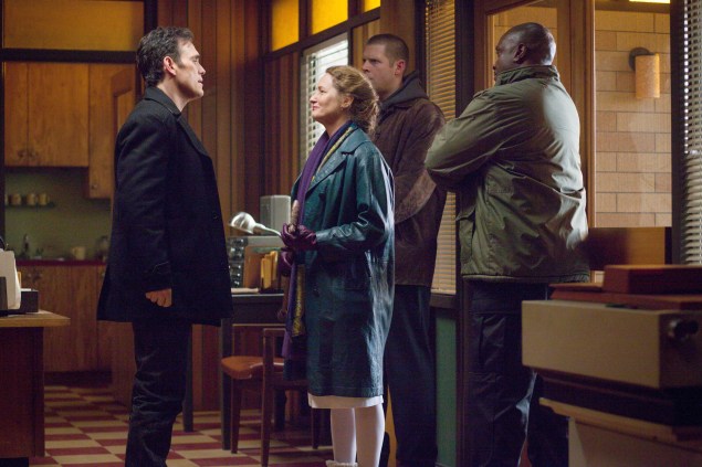 WAYWARD PINES:   Pam (Melissa Leo, second from L) pays a visit to Ethan (Matt Dillon, L) in the "One of Our Senior Realtors Has Chosen to Retire" episode of WAYWARD PINES airing Thursday, June 4 (9:00-10:00 PM ET/PT) on FOX.  ©2015 Fox Broadcasting Co.  Cr:  Liane Hentscher/FOX