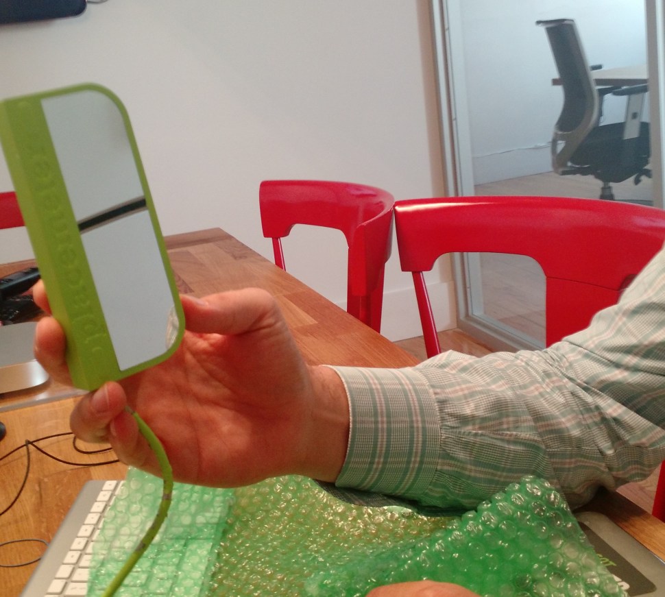 Placemeter CEO Alexandre Winter shows the prototype sensor. (Photo: Brady Dale/Observer)