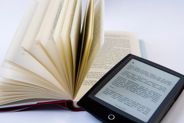 Bound Book vs. E-book (Photo: Ulrich Baumgarten/Getty)