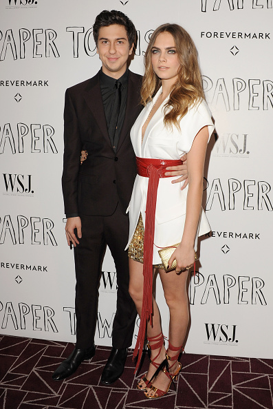 Ms. Delevingne alongside her co-star Mr. Wolff at the "Paper Towns" screening (Photo by Jon Kopaloff/Getty Images)