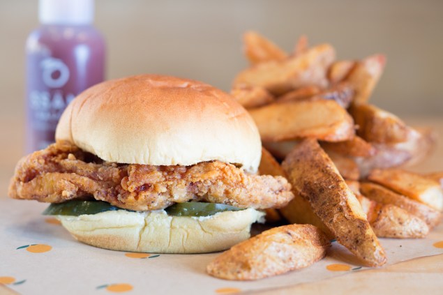 David Chang's spicy fried chicken sandwich at Fuku, in the East Village. (Photo: Gabriele Stabile)