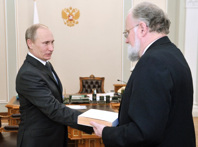 Russian President Vladimir Putin (L) shakes hands with Russian Central Election Commission Chairman Vladimir Churov after receiving an identity document of the Russian President at the Novo-Ogaryovo residence outside Moscow on May 8, 2012. AFP PHOTO / RIA-NOVOSTI POOL / ALEXEI NIKOLSKY (Photo credit should read ALEXEI NIKOLSKY/AFP/GettyImages)