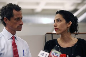 Count Anthony Weiner and wife Huma Abedin, who has worked for Clinton for two decades, among her loyal backers.  (John Moore/Getty Images)