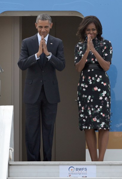 Michelle Obama dons a black and white frock for a visit to Japan (Photo:  PRAKASH SINGH/AFP/Getty Images)