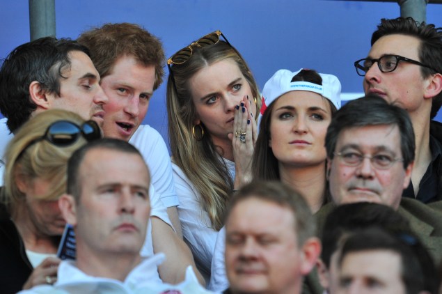 Prince Harry and Bonas at a rugby match in 2014.  (Photo: GLYN KIRK/AFP/Getty Images)