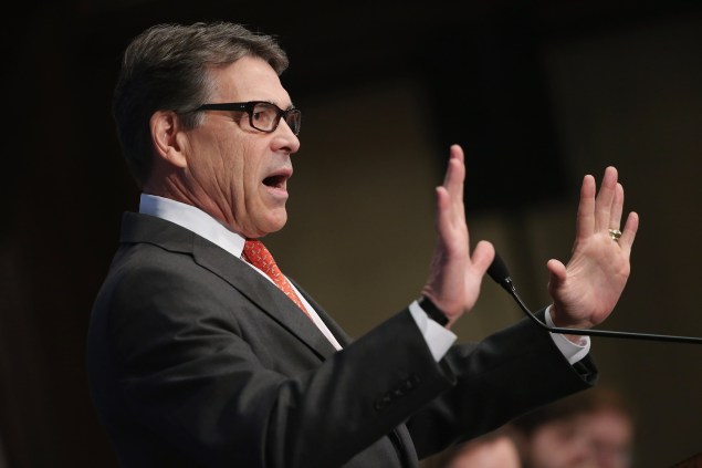 WASHINGTON, DC - JULY 02:  Former Texas Governor and Republican presidential candidate Rick Perry addresses the National Press Club Luncheon July 2, 2015 in Washington, DC. Perry began his speech about how African-Americans should support him and the GOP by recounting the racially-motivated 1916 lynching of Jesse Washington in Waco, Texas, and how far Texas and the nation had come since that time.  (Photo by Chip Somodevilla/Getty Images)