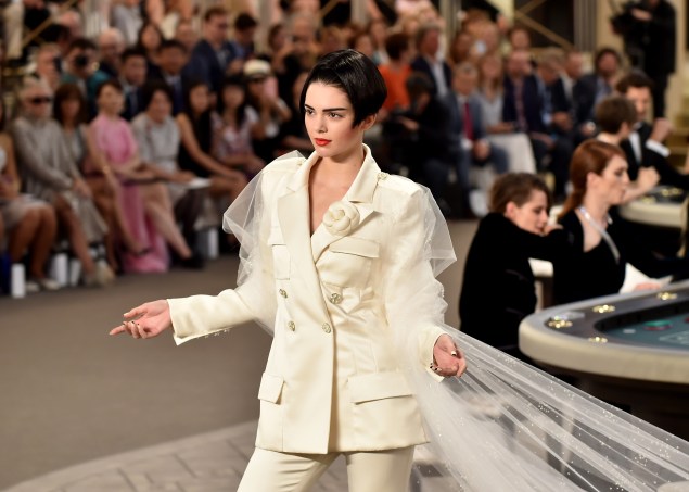Kendall Jenner sported a shorter look on the Chanel runway in Paris today. (Photo: Getty)