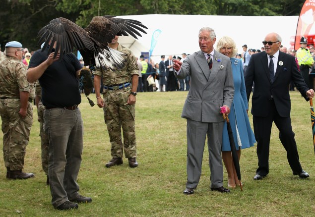 At first, Prince Charles seems interested. (Photo: Chris Jackson/Getty Images)