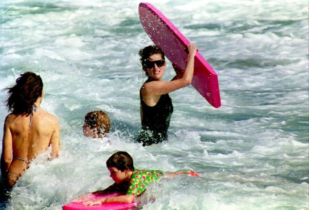 Princess Diana got her surf on during a 1993 holiday to the British Virgin Islands. (Photo credit should read PAUL J. RICHARDS/AFP/Getty Images)