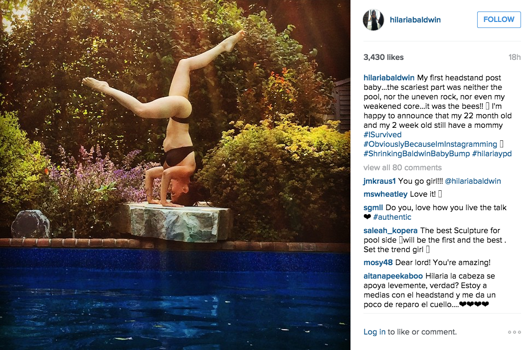 Ms. Baldwin did a poolside handstand. (Photo: Instagram/Hilaria Baldwin)