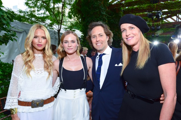 Ms. Kruger and Ms. Hicks stuck to black and white, while Mr. Lauren wore a blue suit and textured knit tie. (Photo: Patrick McMullan)