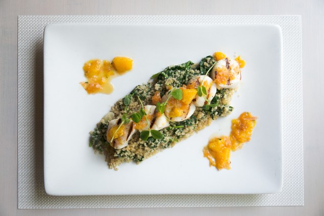 Grilled scallops with tarragon-citrus butter, baby spinach, toasted quinoa (Photo: Courtesy)