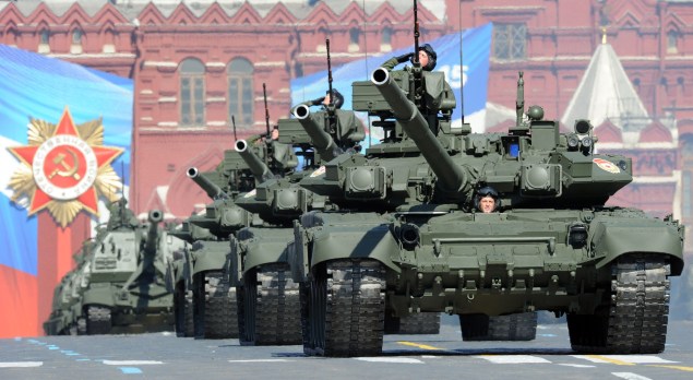 A column of Russia's T-90 tanks rolls at the Red Square in Moscow, on May 9, 2013, during Victory Day parade. Fighter jets screamed over Red Square and heavy tanks rumbled over its cobblestones as Russia flexed today its military muscle on the anniversary of its costly victory over Nazi Germany in World War II.   AFP PHOTO / YURI KADOBNOV        (Photo credit should read YURI KADOBNOV/AFP/Getty Images)
