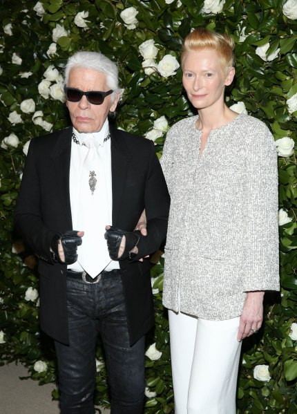 Tilda Swinton and Karl Lagerfeld at a 2013 MoMA event honoring Ms. Swinton. (Photo: Rob Kim/Getty Images)