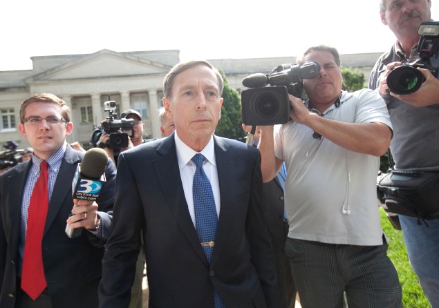 CHARLOTTE, NC  - APRIL 23:  Former director of CIA and former commander of U.S. Forces in Afghanistan Gen. David Petraeus exits the federal courthouse after facing criminal sentencing on April 23, 2015 in Charlotte, North Carolina.   Petraeus faced criminal sentencing for giving classified information to his former mistress and biographer.  (Photo by John W. Adkisson/Getty Images)