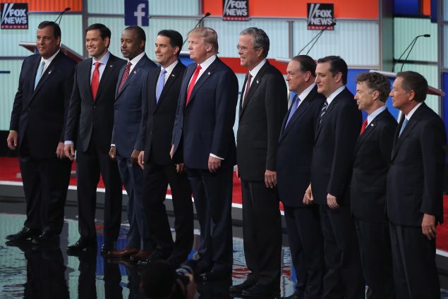 CLEVELAND, OH - AUGUST 06: Republican presidential candidates (L-R) New Jersey Gov. Chris Christie, Sen. Marco Rubio (R-FL), Ben Carson, Wisconsin Gov. Scott Walker, Donald Trump, Jeb Bush, Mike Huckabee, Sen. Ted Cruz (R-TX), Sen. Rand Paul (R-KY) and John Kasich take the stage for the first prime-time presidential debate hosted by FOX News and Facebook at the Quicken Loans Arena August 6, 2015 in Cleveland, Ohio. The top-ten GOP candidates were selected to participate in the debate based on their rank in an average of the five most recent national political polls. (Photo by Scott Olson/Getty Images)