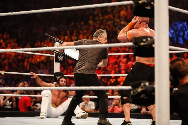 NEW YORK, NY - AUGUST 23: Jon Stewart gets into the action at WWE SummerSlam 2015 Barclays Center of Brooklyn on August 23, 2015 in New York City. (Photo by JP Yim/Getty Images)