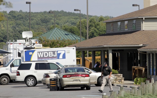 MONETA, VA - AUGUST 26: The TV truck that journalists Alison Parker and Adam Ward drove before they were killed this morning during a live broadcast sits in a parking lot near the scene on August 26, 2015 in Moneta, Virginia. Two employees of WDBJ TV were killed this morning during a live broadcast at Bridgewater Plaza on Smith Mountain Lake. The victims have been identified as reporter Alison Parker and cameraman Adam Ward. Parker, 24 and Ward, 27, worked for WDBJ in Roanoke, Virginia. The suspect, Vester Lee Flanigan, also known as Bryce Williams, died of a self-inflicted gunshot wound. (Photo by Jay Paul/Getty Images)