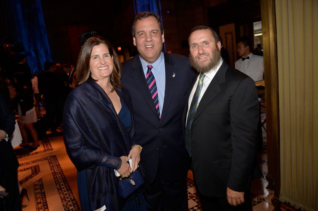 Mary Pat and Chris Christie join Rabbi Shmuley Boteach at the second annual World Jewish Values Network gala dinner on May 18, 2014 in New York City. PolitickerNJ has confirmed that Gov. Christie will be attending a press conference Rabbi Shmuley is organizing on Aug. 25 to urge Sen. Booker and other members of NJ Congressional delegation to oppose the Iran deal. (Ben Gabbe/Getty Images for This World Jewish Values Network)