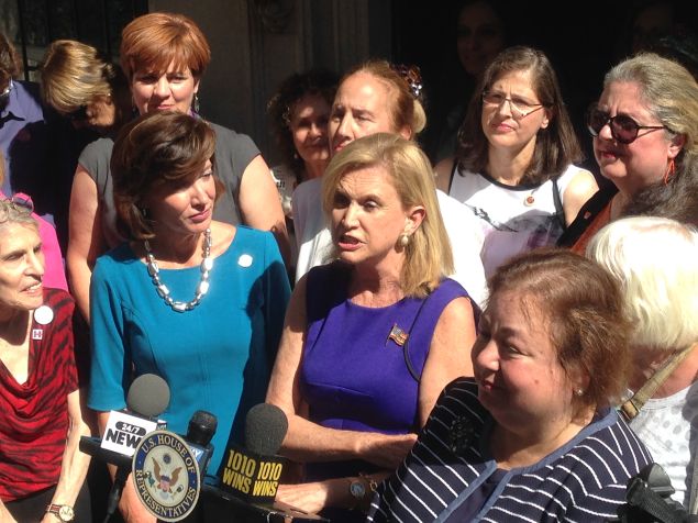 Congresswoman Carolyn Maloney, center, called for gender equity in Times Square (Photo: Will Bredderman for Observer).