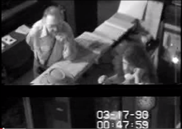 Mr. Abath making a phone call in the footage.  (Photo: Video Still via YouTube, Courtesy FBI)
