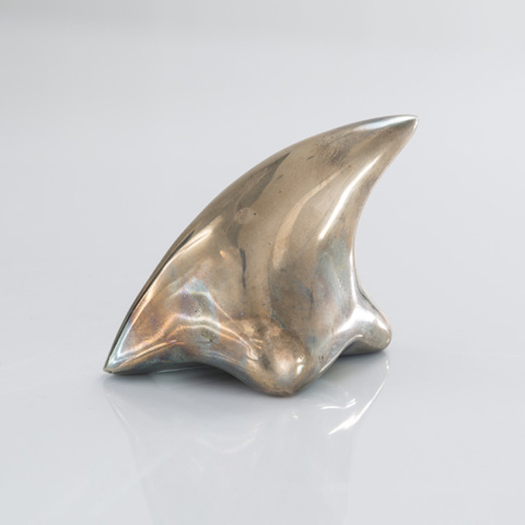 Sculptural prehistoric tooth form in bronze by Rogan Gregory. (Photo: Courtesy of R & Company)