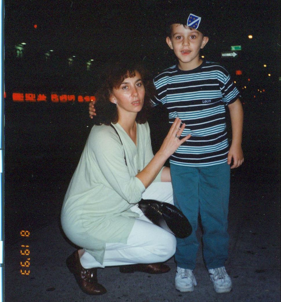 The author and his mother in Astoria, Queens during their first month in the U.S. He is wearing a Bosnian military beret. (Courtesy Arman Dzidzovic)