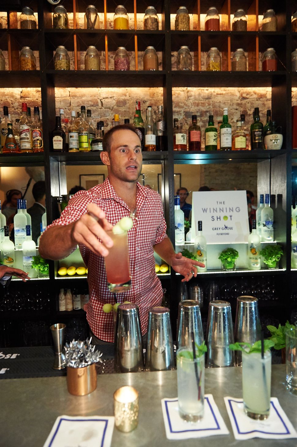 Andy Roddick mixing a Grey Goose "Honey Deuce" at MACE Bar (Photo: Grey Goose).