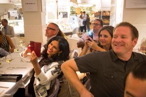 Guests snap a celeb chef at Eataly's Fifth Birthday Bash. Photograph by Michael Nagle for Observer.