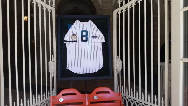 The Yogi Berra jersey at City Hall. (Photo: Ross Barkan for Observer)