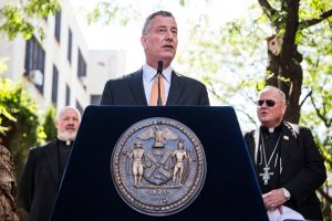 Mayor de Blasio outlined increased spending on new legal counsel programs, aiming to help evicted families in the city. (Photo by Andrew Burton/Getty Images)