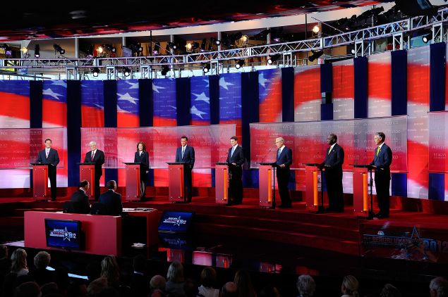 SIMI VALLEY, CA - SEPTEMBER 7: Republican presidential candidates (L-R) Rick Santorum, Newt Gingrich, Michele Bachmann, Mitt Romney, Rick Perry, Ron Paul, Herman Cain and Jon Huntsman, Jr. debate in the Ronald Reagan Centennial GOP Presidential Primary Candidates Debate at the Ronald Reagan Presidential Library on September 7, 2011 in Simi Valley, California. The debate is sponsored by POLITICO and NBC News. (Photo by Kevork Djansezian/Getty Images)
